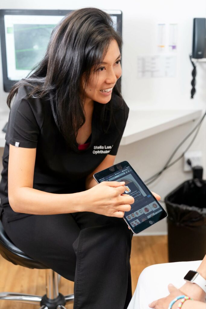 Dr. Stella L. Luo with a patient